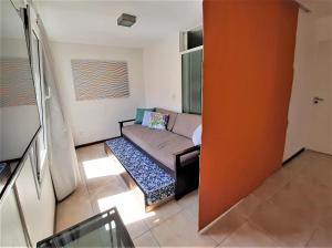 a living room with a couch in a room at Departamento Mariano Moreno in San Martín de los Andes