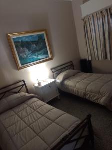 Tempat tidur dalam kamar di Altos de Quintana Alojamiento compartido