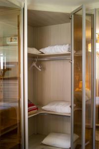 Μία ή περισσότερες κουκέτες σε δωμάτιο στο Apto Luxo Centro Gramado