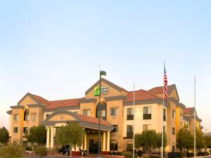 a building with a flag in front of it at Holiday Inn Express Hotel & Suites Barstow, an IHG Hotel in Barstow