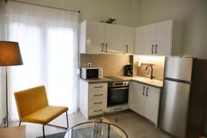 A kitchen or kitchenette at Aelia Apartment 2 Ioannina