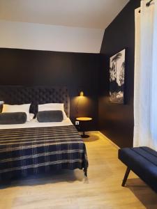 מיטה או מיטות בחדר ב-Le Blue Moon - 50m centre historique - parking privatif