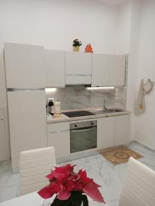 Kuchyň nebo kuchyňský kout v ubytování Maison Riefolo