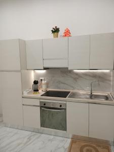 Kuchyň nebo kuchyňský kout v ubytování Maison Riefolo