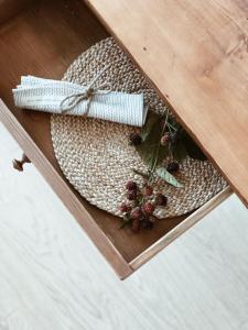 a table with a tray with a napkin on a table at AVLiving City INSIDE NINE Basel in Basel