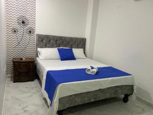 Hotel Orquídea Real客房内的一张或多张床位