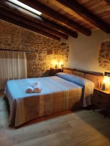 El Castellá tesisinde bir odada yatak veya yataklar