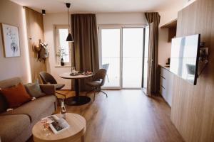Posezení v ubytování Achs-Wendelin Weinlofts