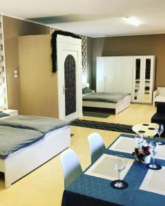 Posezení v ubytování Árkád Apartmanház Szeged