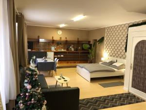 Posezení v ubytování Árkád Apartmanház Szeged