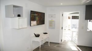 Televízia a/alebo spoločenská miestnosť v ubytovaní Luxury Bungalow Costa Blanca Ground Floor ,StayOrihuelaCosta, Lago Jardin 1#PRP003