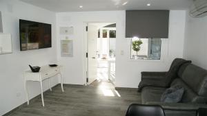 Televízia a/alebo spoločenská miestnosť v ubytovaní Luxury Bungalow Costa Blanca Ground Floor ,StayOrihuelaCosta, Lago Jardin 1#PRP003