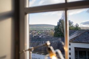 a view of a city from a window at Smart self-catering apartment, Clitheroe in Clitheroe