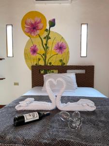 Postel nebo postele na pokoji v ubytování Hotel Karukera