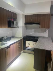 Kuchyň nebo kuchyňský kout v ubytování Departamento cerca del Aeropuerto y Foro sol + 4 fotografie