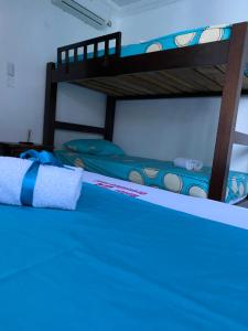 Hotel Orquídea Real客房内的一张或多张床位
