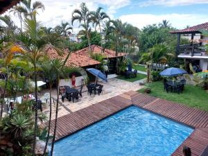an aerial view of a resort with a swimming pool at Pousada Solar de Itaúna in Saquarema