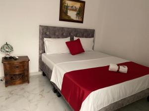 Hotel Orquídea Real客房内的一张或多张床位