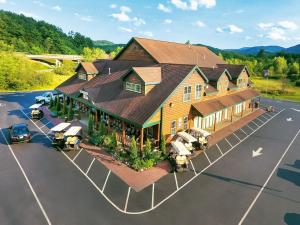 an overhead view of a large building with a parking lot at Lake George Escape in Warrensburg