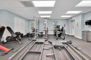 a gym with several treadmills and exercise machines at Indigo Reef Resort in Marathon