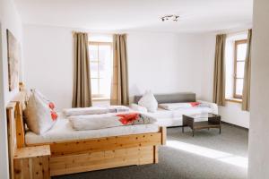 Uma cama ou camas num quarto em Gasthof Franziskibad