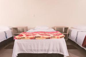 Letto o letti in una camera di Vivienda turística Arboleda de Cádiz