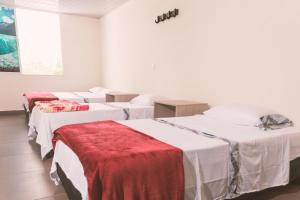 Letto o letti in una camera di Vivienda turística Arboleda de Cádiz