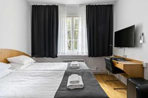Postel nebo postele na pokoji v ubytování Best Western Hotel Anno 1937