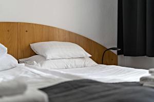 Postel nebo postele na pokoji v ubytování Best Western Hotel Anno 1937