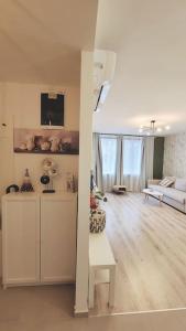 A bed or beds in a room at DN Green apartment