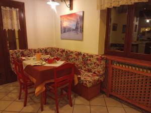 Restavracija oz. druge možnosti za prehrano v nastanitvi Albergo Martinet
