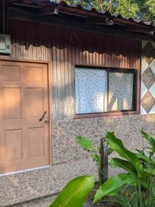 a house with a door and a window at La Katalinda in Drake +30 photos