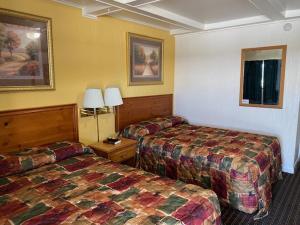 Postel nebo postele na pokoji v ubytování RANGER MOTEL