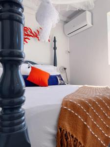 Postel nebo postele na pokoji v ubytování Villa MauCa