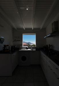 Kuchyň nebo kuchyňský kout v ubytování Villa MauCa