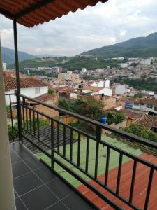 a view of the city from the balcony of a house at hotel Valery in San Gil