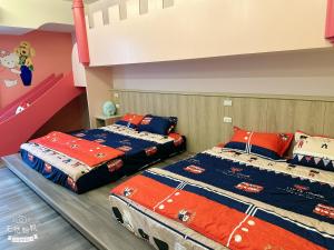 Letto o letti in una camera di 山田心溜滑梯民宿