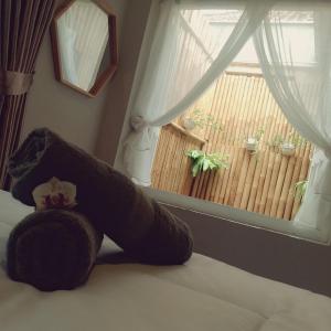 Ein Bett oder Betten in einem Zimmer der Unterkunft The Bloomy House