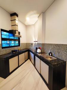 Dapur atau dapur kecil di Beautiful House in City Centre