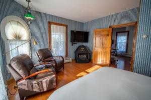 Televiisor ja/või meelelahutuskeskus majutusasutuses Albergo Allegria Hotel & Breakfast Restaurant