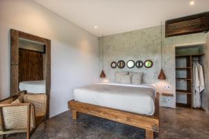 Hidden Gem Suites Ubud客房内的一张或多张床位