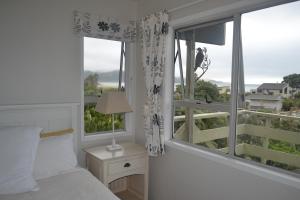 Postel nebo postele na pokoji v ubytování AHIPARA GOLDENSANDs