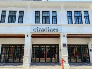 a building with a sign that reads charities at Citadines Connect Georgetown Penang in George Town