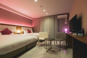 TV a/nebo společenská místnost v ubytování Liberated HOTEL Haruyoshi Kaichi