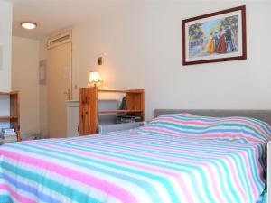 Postel nebo postele na pokoji v ubytování Appartement Le Lavandou, 2 pièces, 4 personnes - FR-1-251-292