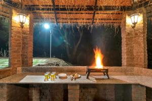 Φωτογραφία από το άλμπουμ του SaffronStays Laburnum House - 3BHK Pet-Friendly Villa with Pool, Lawn & Countryside Views σε Wada