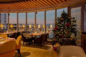 Veitingastaður eða matsölustaður á Golden Palace Hotel