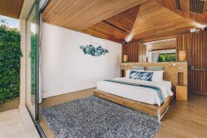 Postel nebo postele na pokoji v ubytování Allure Resort + 37 fotografií