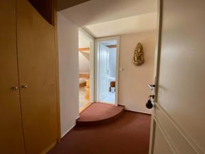 Postel nebo postele na pokoji v ubytování Hotel Zámeček na Čeladné