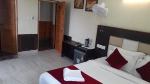 Postel nebo postele na pokoji v ubytování Nadi Mountain view Hotel